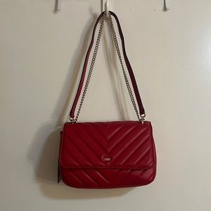 Brand new red DKNY purse WITH TAGS.
